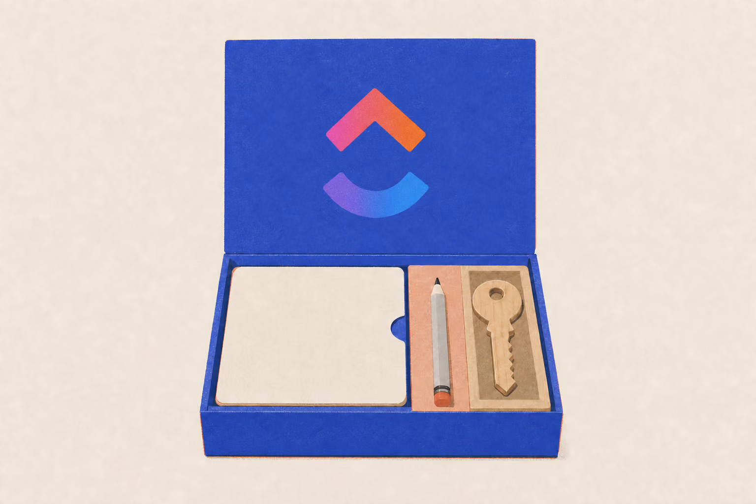 An open starter kit box holds a task card, pencil, divider, and key in shallow compartments
